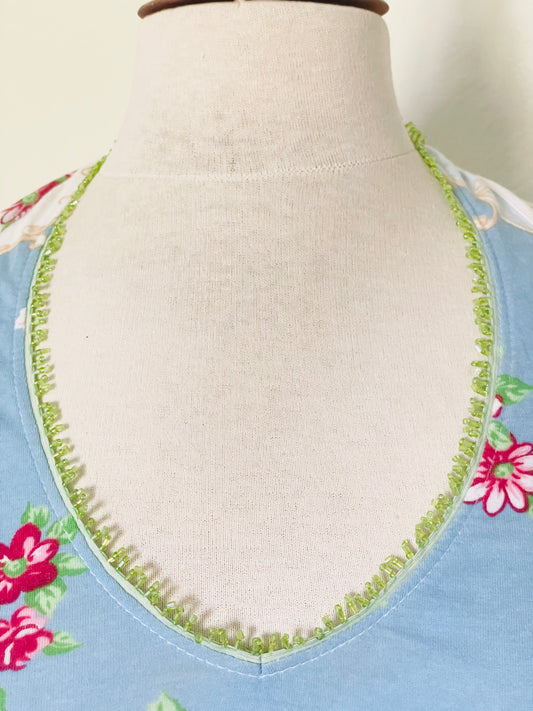 Top style années 80 dos nu échancré et perles