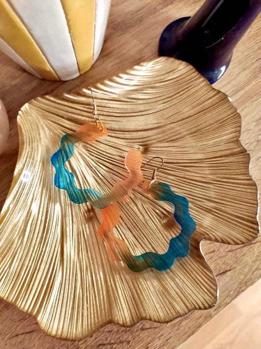 Boucles d'oreilles vagues bleu et orange transparents