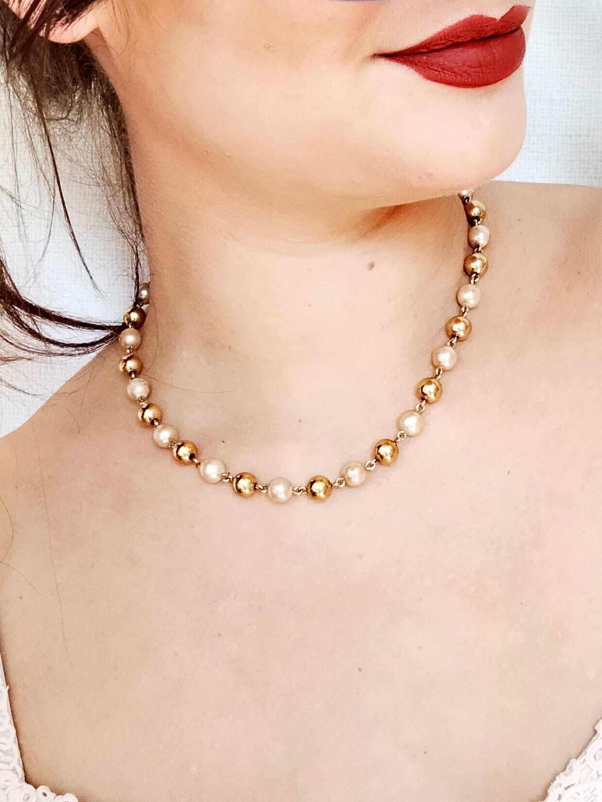 Collier de perles dorées